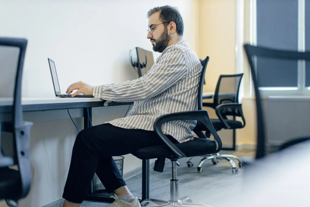 Clark Staff professional at a Tbilisi workstation, featured with outsourcing planning tools