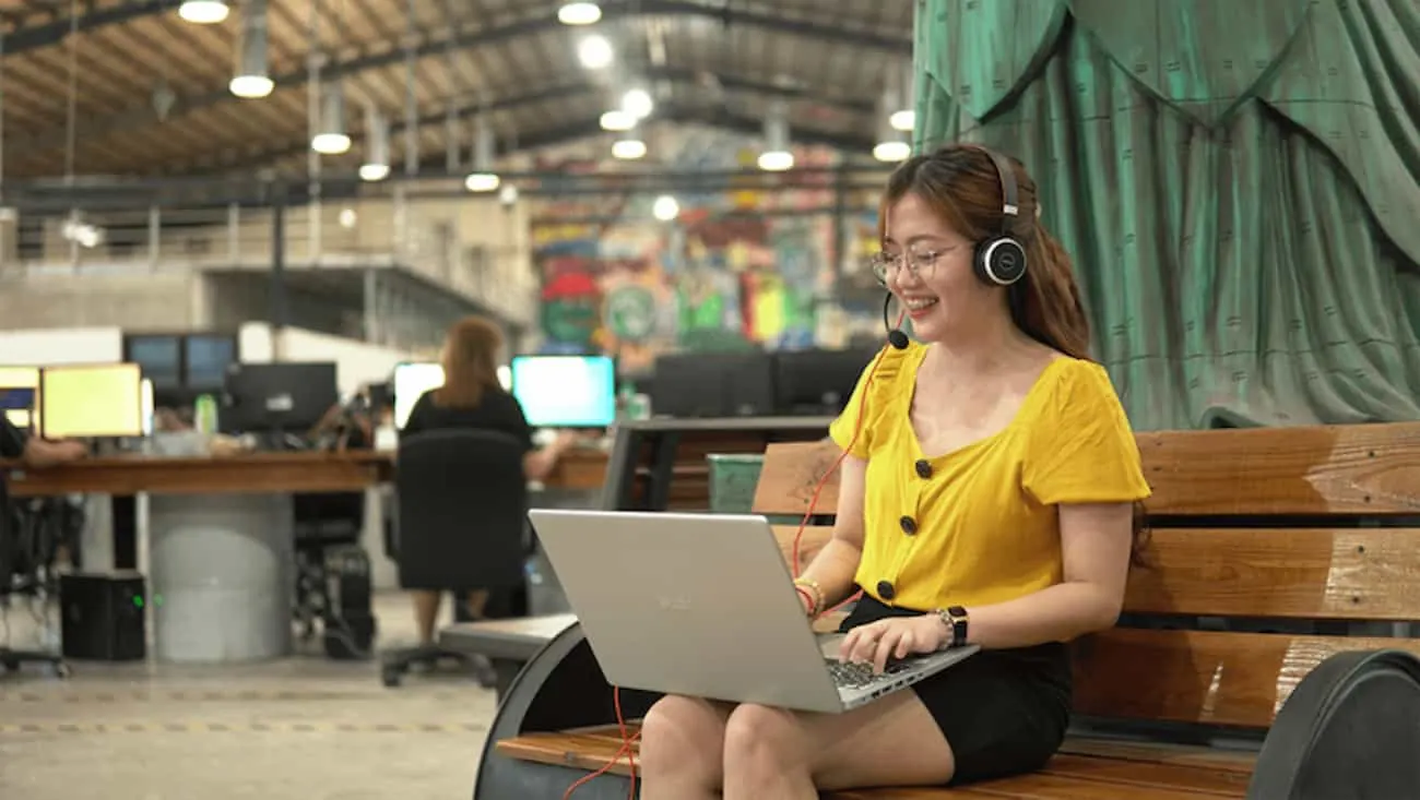 Clark Staff professional with a headset, featured with outsourcing readiness guidance