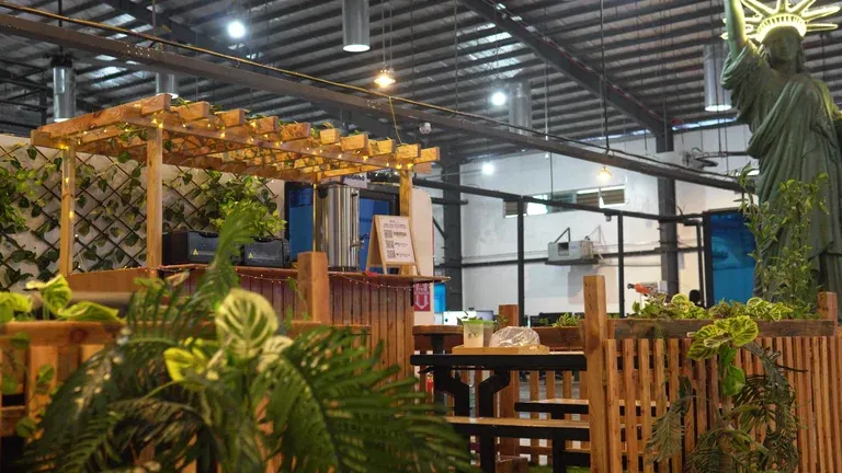 Shared workplace with plants at Clark Staff, featured with its ESG initiatives